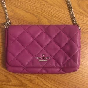 Magenta crossbody with metal Kate spade logo
